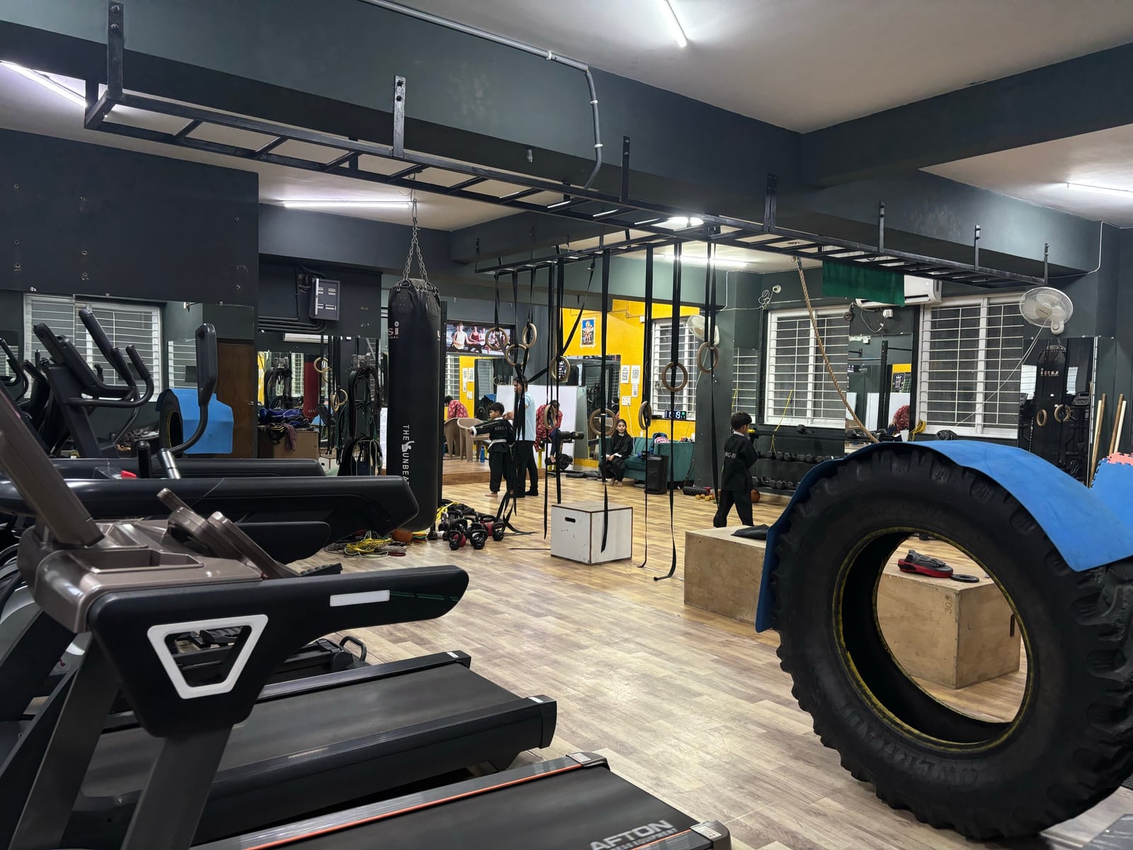 Treadmills, a training tyre and conditioning equipment inside IMFIT Madhapur