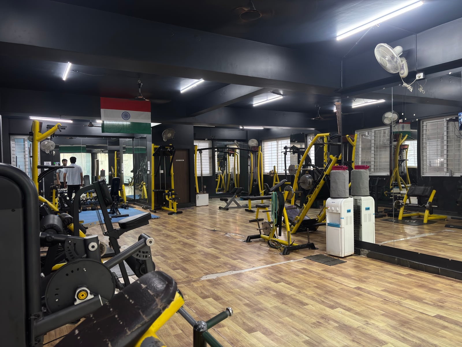 Resistance machines and open training space on IMFIT’s third-floor strength and hypertrophy area in Madhapur